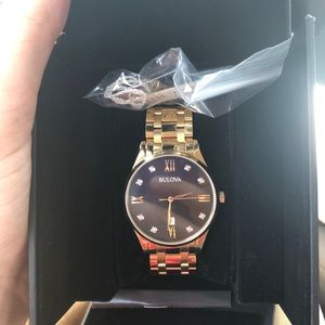 Bulova gold and diamond watch